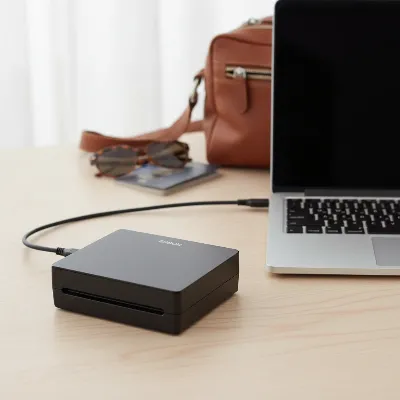 Epson WorkForce ES-50 portable scanner illustrating its compact design and USB connectivity